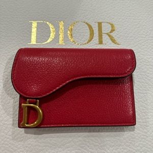 Brand new calfskin saddle wallet. Retail price $460